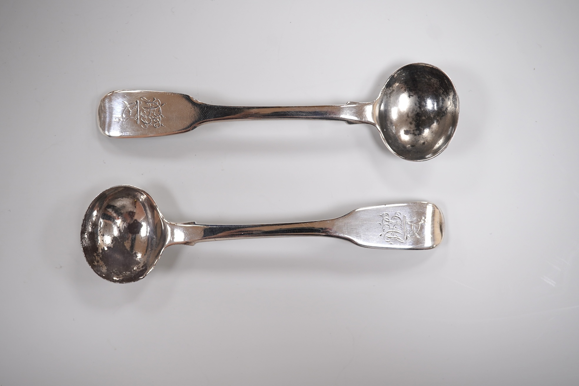A pair of early Victorian silver cauldron salts, by John Tapley, London, 1838, with later blue glass liners, diameter 94mm, together with a pair of George IV silver Old English pattern condiment spoons, London, 1828.